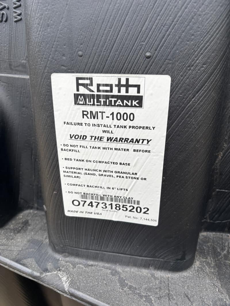 Manufacturer label on a Roth septic tank